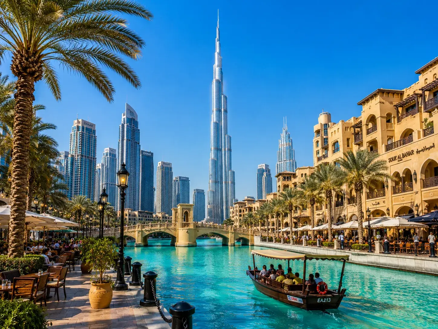 Burj Khalifa in Dubai with waterfront and palm trees